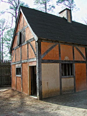 building with roof of clapboard