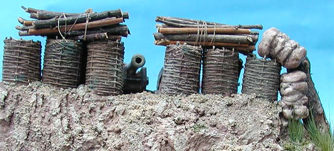 Gabions, fascines and wool bales protect an artillery position